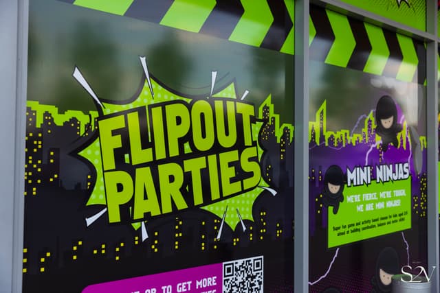 FlipOut Party sign