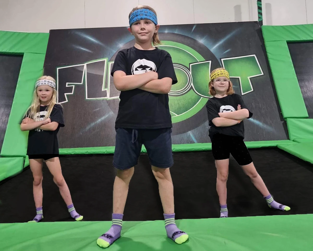Three kids in Ninja trampoline class